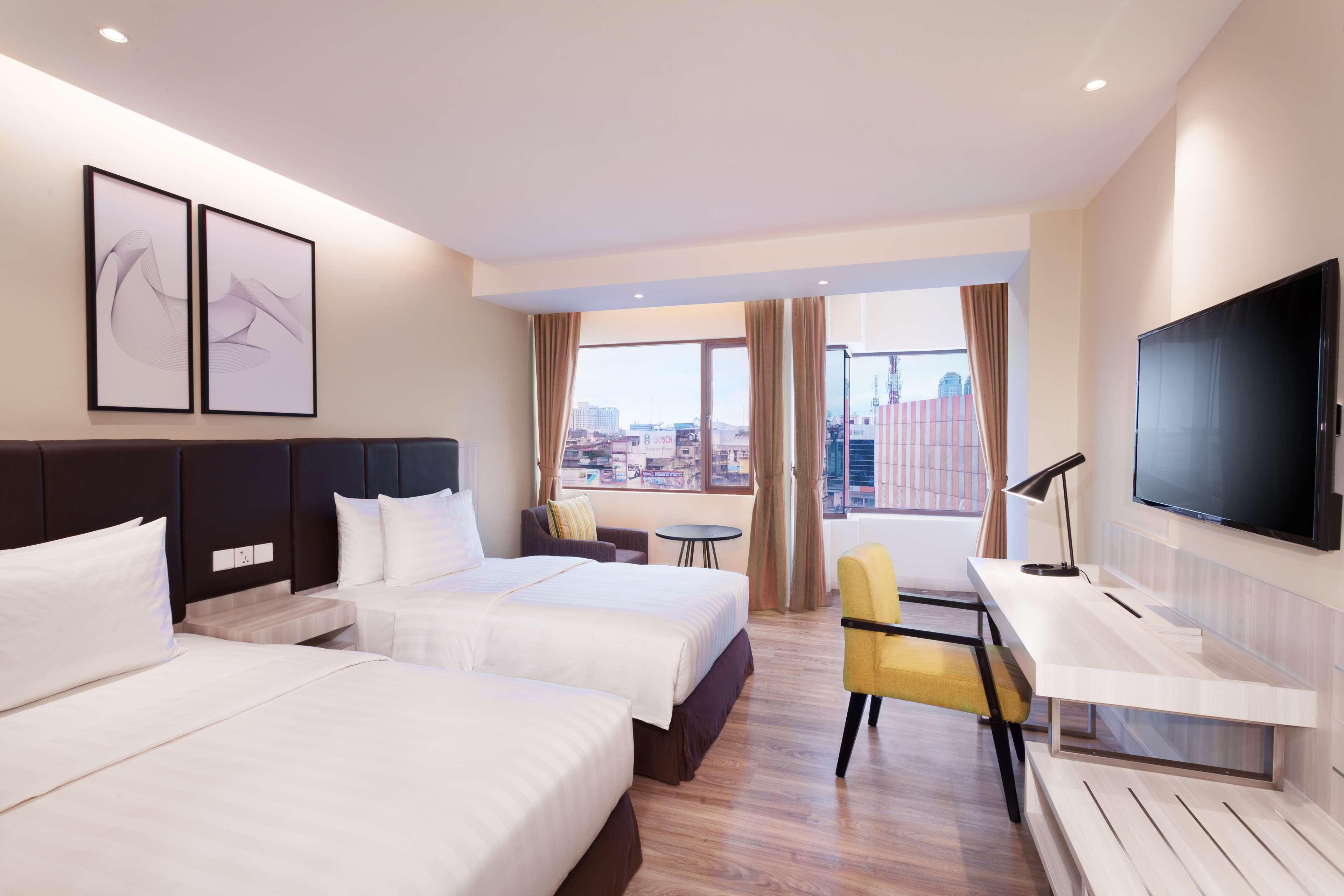 Aiho Hotel Medan Phòng bức ảnh